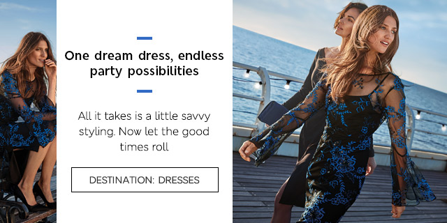 Model wears black sheer dress with blue embroidery